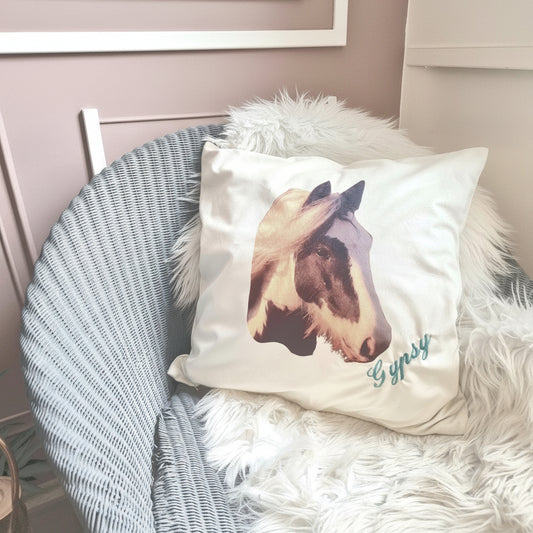 A personalised cushion featuring an image of a horse's head on a white background, with the word 'Gypsy' embroidered below.